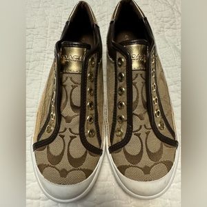 Coach sneakers metallic gold detailing in size 7
